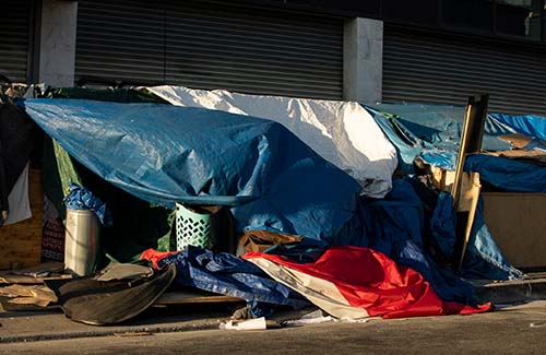 homeless tents on a sidewalk